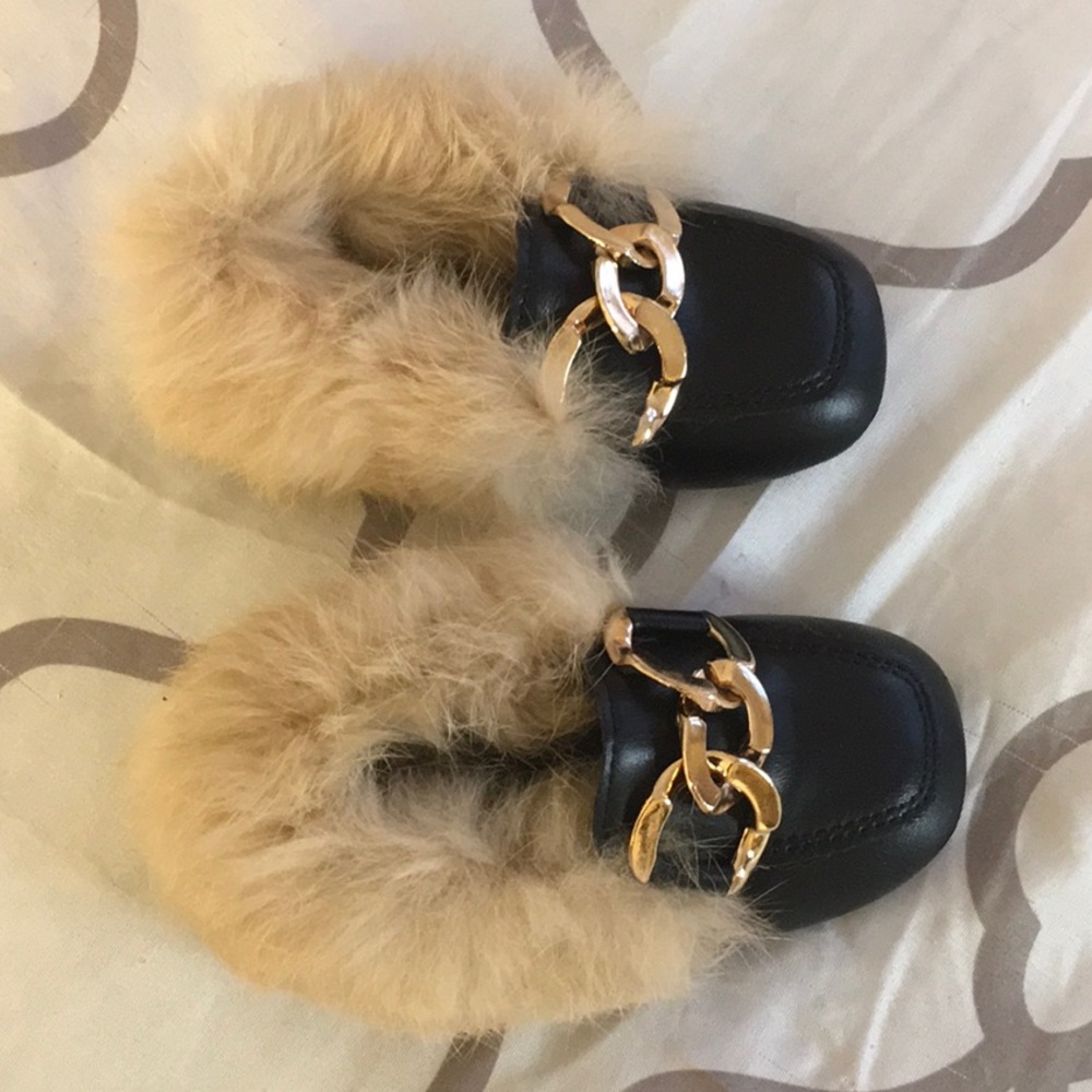 Black faux fur loafers
